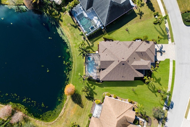 drone / aerial view with a water view