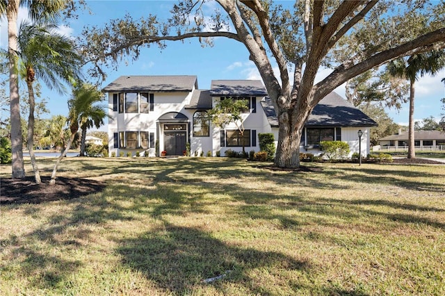 view of front of home with a front yard