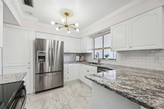 kitchen with stainless steel appliances, light stone countertops, sink, and white cabinets