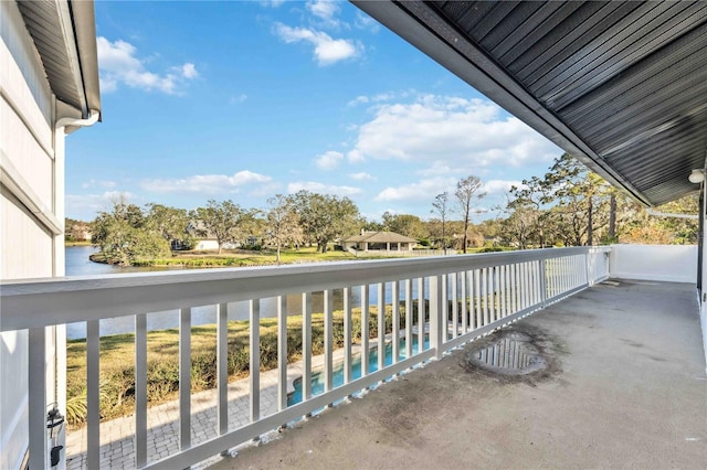 balcony featuring a water view