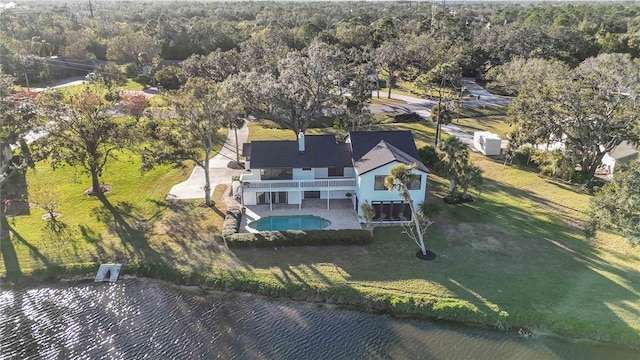 drone / aerial view with a water view