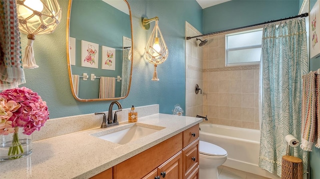 full bathroom featuring shower / bath combination with curtain, vanity, and toilet