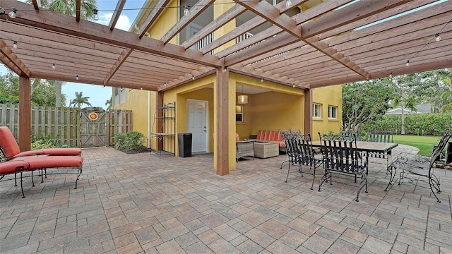 view of patio / terrace with an outdoor living space and a pergola