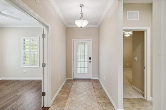 4891 Maymont Park Cir, Bradenton, FL 34203 - foyer entrance featuring ceiling fan and ornamental molding