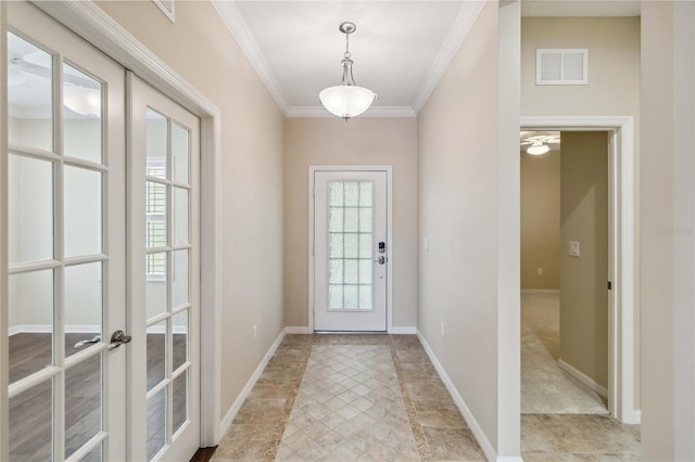 4891 Maymont Park Cir, Bradenton, FL 34203 - entryway with french doors and crown molding