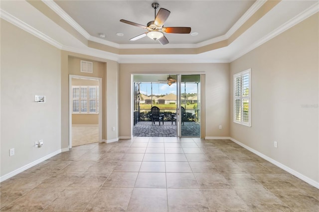 4891 Maymont Park Cir, Bradenton, FL 34203 - unfurnished room with ceiling fan, ornamental molding, and a tray ceiling