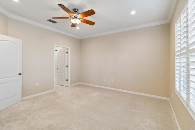 4891 Maymont Park Cir, Bradenton, FL 34203 - unfurnished room featuring light carpet, plenty of natural light, ornamental molding, and ceiling fan