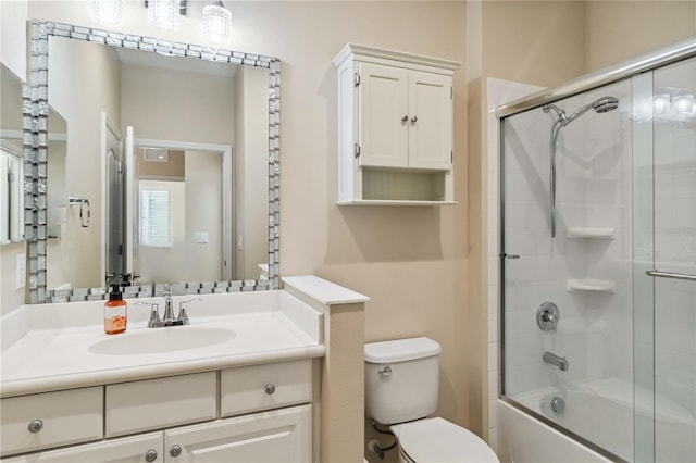 4891 Maymont Park Cir, Bradenton, FL 34203 - full bathroom featuring vanity, shower / bath combination with glass door, and toilet