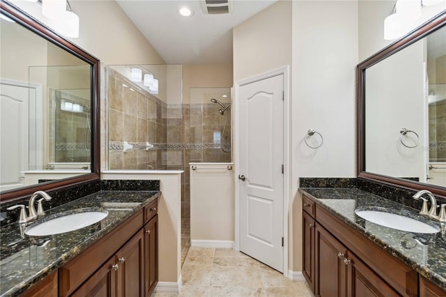 4891 Maymont Park Cir, Bradenton, FL 34203 - bathroom featuring vanity, tile patterned flooring, and tiled shower