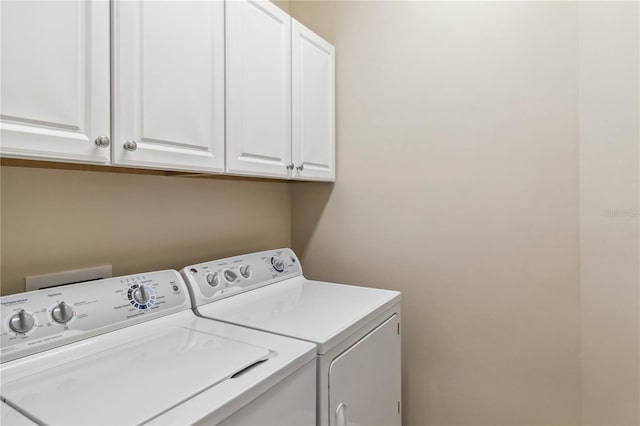 4891 Maymont Park Cir, Bradenton, FL 34203 - laundry area with cabinets and independent washer and dryer