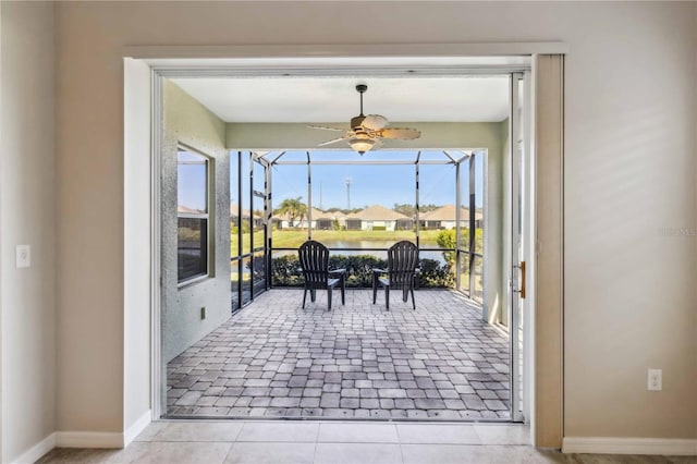 4891 Maymont Park Cir, Bradenton, FL 34203 - interior space featuring ceiling fan and light tile patterned floors