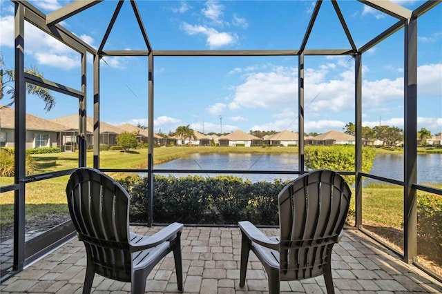 4891 Maymont Park Cir, Bradenton, FL 34203 - sunroom featuring a water view