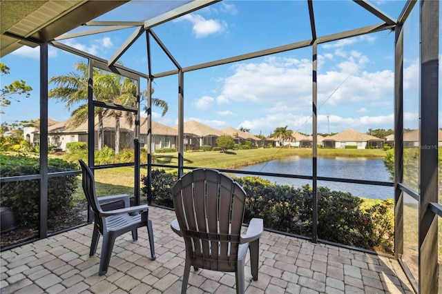 4891 Maymont Park Cir, Bradenton, FL 34203 - sunroom / solarium featuring a water view