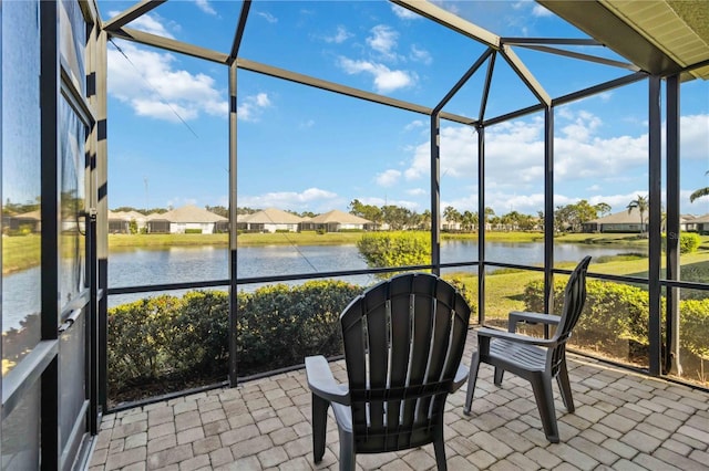 4891 Maymont Park Cir, Bradenton, FL 34203 - sunroom featuring a water view