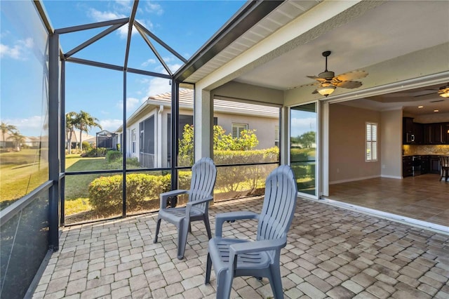 4891 Maymont Park Cir, Bradenton, FL 34203 - sunroom with a healthy amount of sunlight and ceiling fan