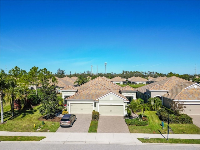 4891 Maymont Park Cir, Bradenton, FL 34203 - view of front of property with a front lawn