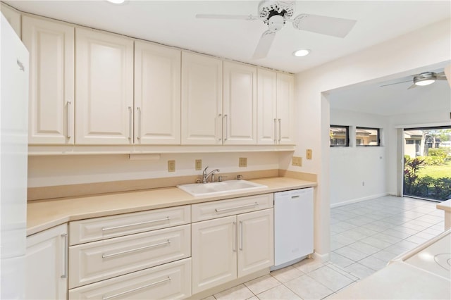 kitchen with ceiling fan, dishwasher, sink, and light tile patterned floors