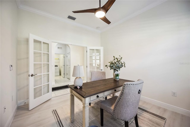 home office with french doors, visible vents, and crown molding