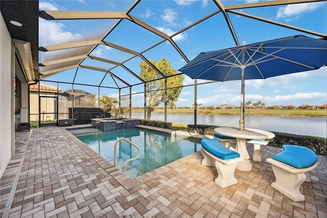 view of pool with glass enclosure and a patio