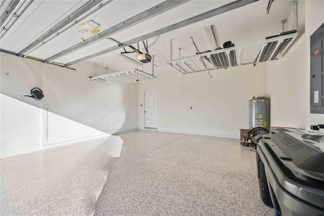 garage with water heater and a garage door opener