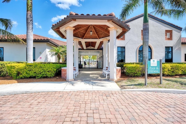 view of property's community with a gate