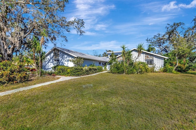 exterior space with a lawn