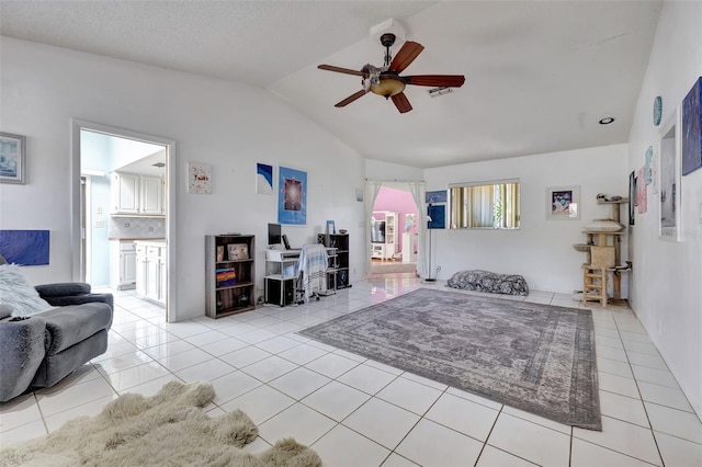 interior space featuring lofted ceiling, ceiling fan, visible vents, and tile patterned floors