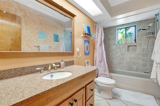 bathroom featuring shower / bath combo, tile patterned flooring, vanity, and toilet