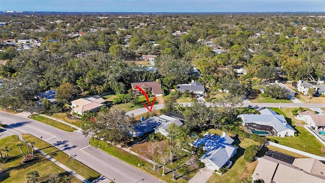 birds eye view of property with a residential view