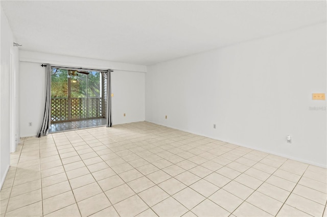 empty room featuring light tile patterned floors