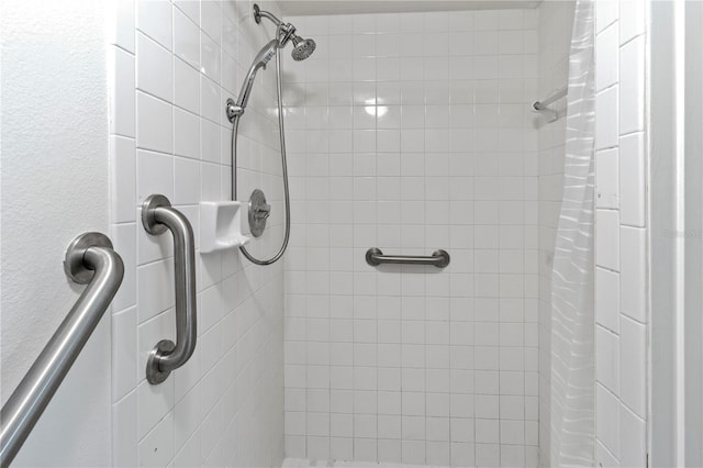 bathroom with a shower with shower curtain