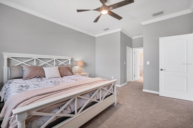 bedroom featuring crown molding, ceiling fan, and carpet flooring