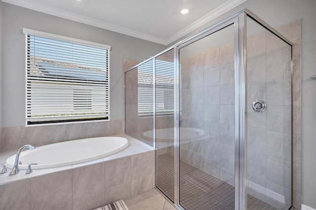 bathroom with shower with separate bathtub, ornamental molding, and tile patterned floors