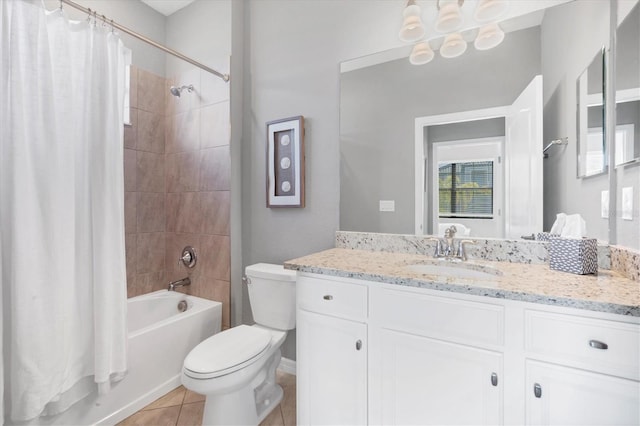 full bathroom featuring shower / tub combo with curtain, vanity, tile patterned floors, and toilet