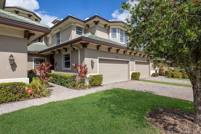 view of side of home with a garage and a yard