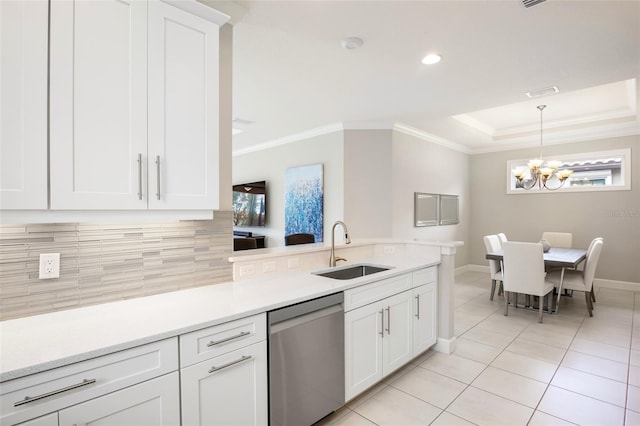 kitchen with sink, ornamental molding, stainless steel dishwasher, and white cabinets