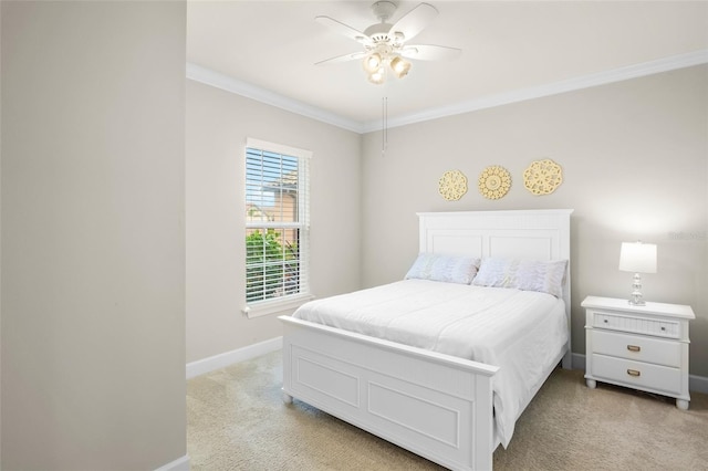 bedroom featuring light carpet, ornamental molding, and ceiling fan