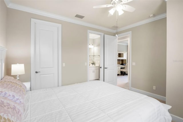 bedroom with crown molding, ceiling fan, and ensuite bath