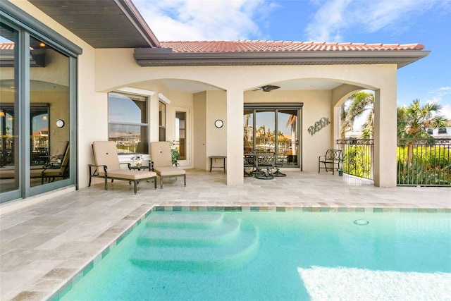 rear view of house with a patio