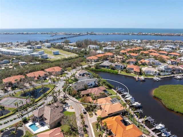 bird's eye view with a water view