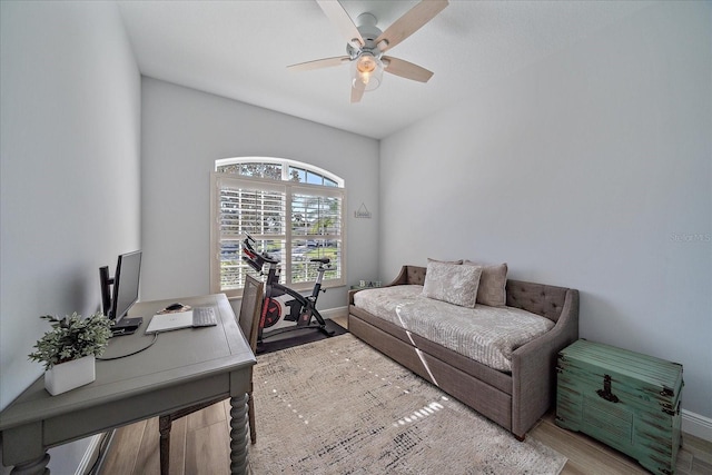 home office featuring ceiling fan and wood-type flooring