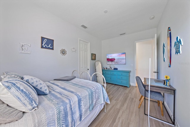 bedroom featuring light hardwood / wood-style floors