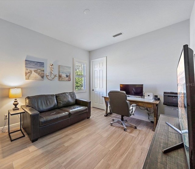 office space featuring light hardwood / wood-style flooring