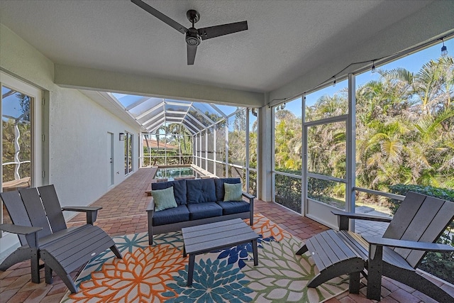 sunroom / solarium with vaulted ceiling and ceiling fan