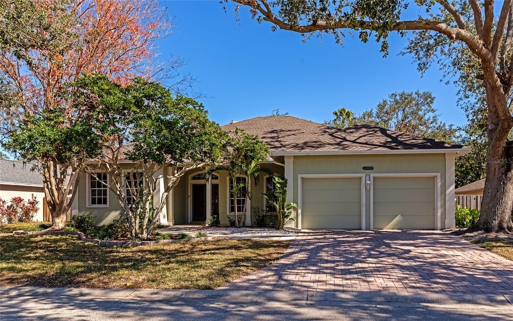 view of front of property featuring a garage