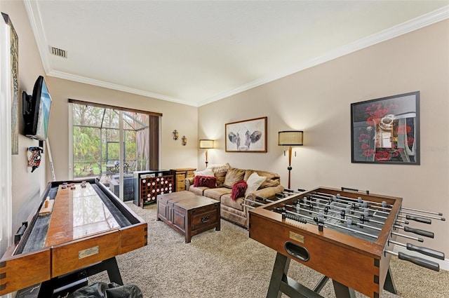 rec room featuring crown molding and carpet floors