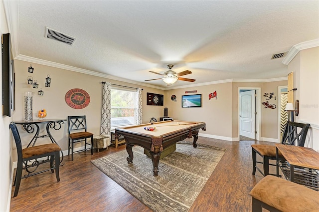 recreation room with billiards, crown molding, a textured ceiling, dark hardwood / wood-style flooring, and ceiling fan