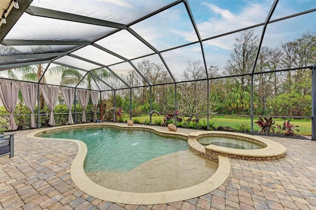 view of swimming pool with an in ground hot tub, a patio, pool water feature, and glass enclosure