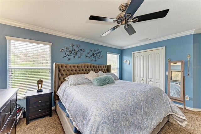 223 Heritage Isles Way, Bradenton, FL 34212 - bedroom with a closet, crown molding, visible vents, and light carpet