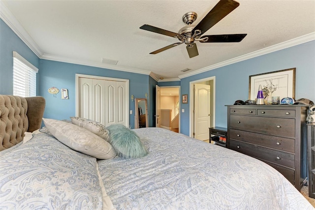 223 Heritage Isles Way, Bradenton, FL 34212 - bedroom with crown molding, visible vents, and a closet